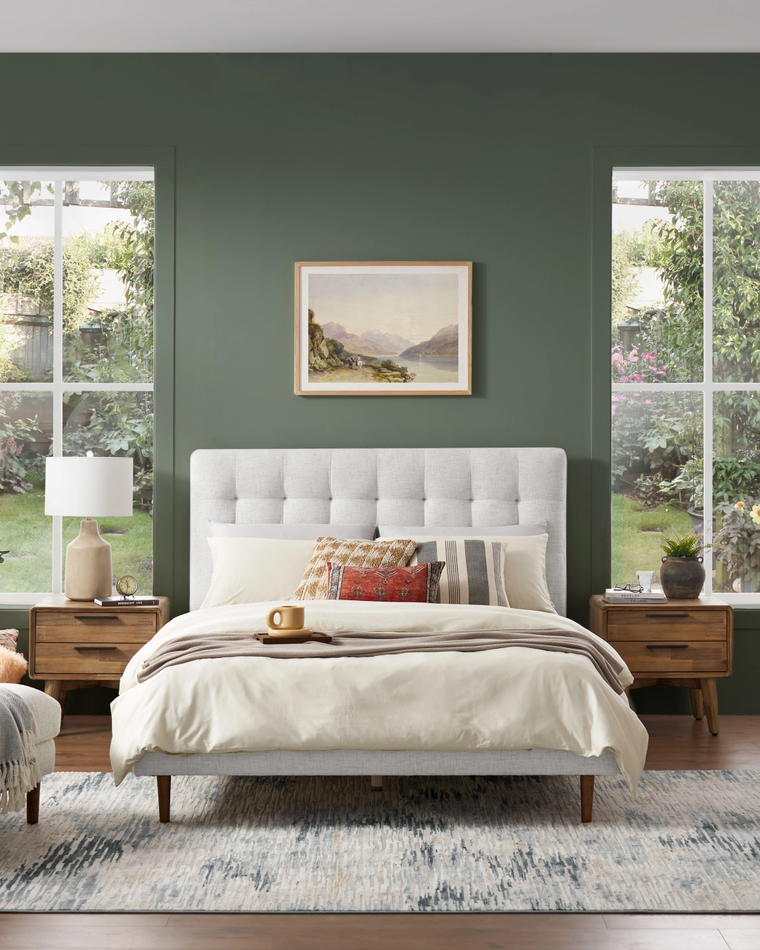 Front view of the minimalist tufted headboard bed in a neutral setting