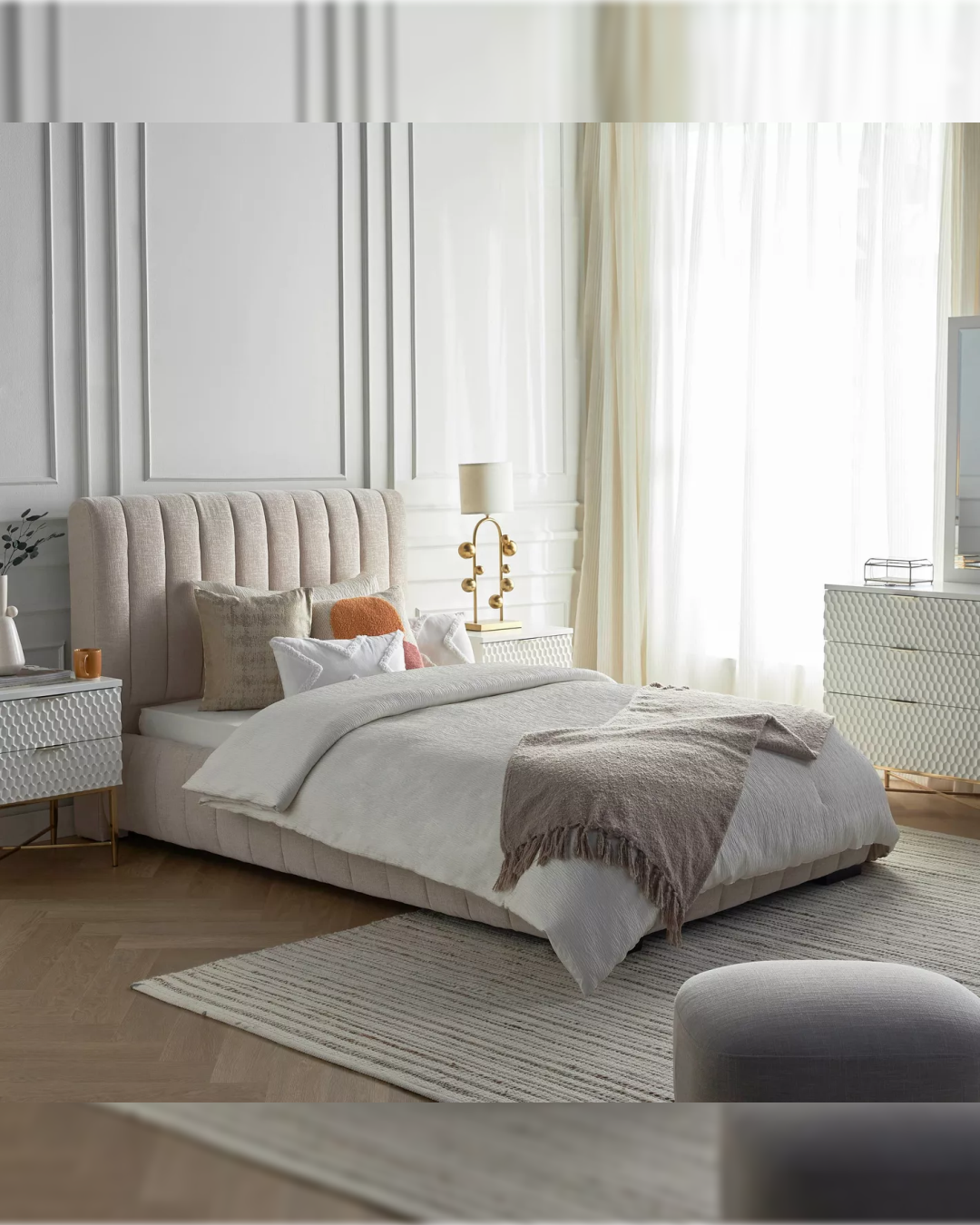 Side angle view of Dunlyn bed styled in a modern minimal bedroom setting with natural light.