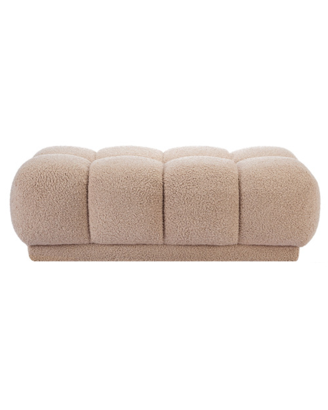 Side view of Foxbourne footstool showing curved corner detailing and soft edges