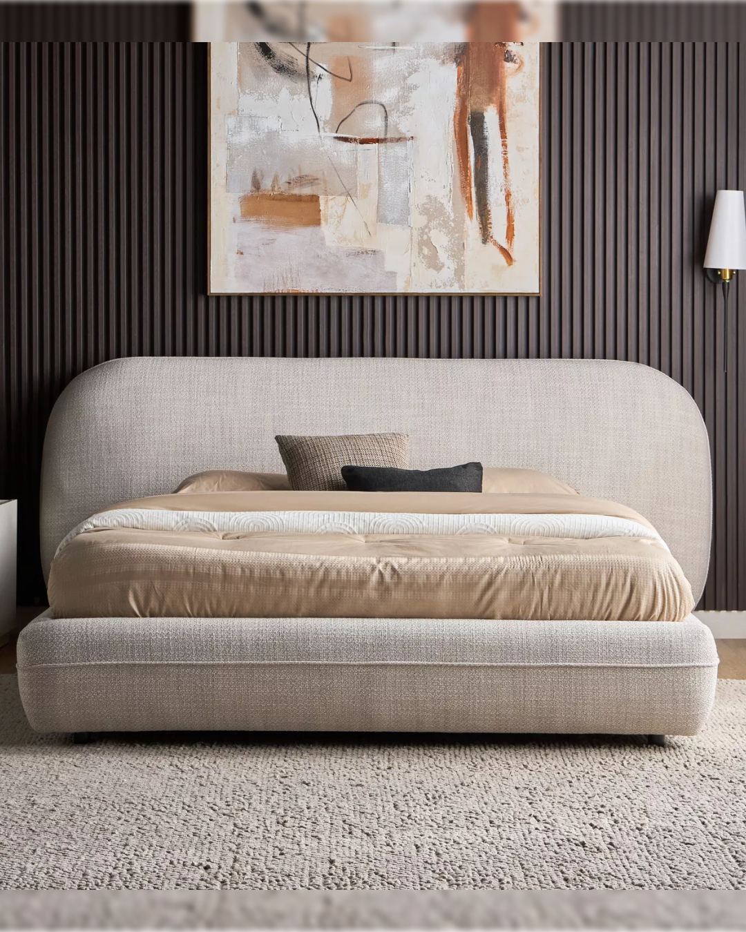 Front elevation of Oakdale bed with curved headboard and thick padded base