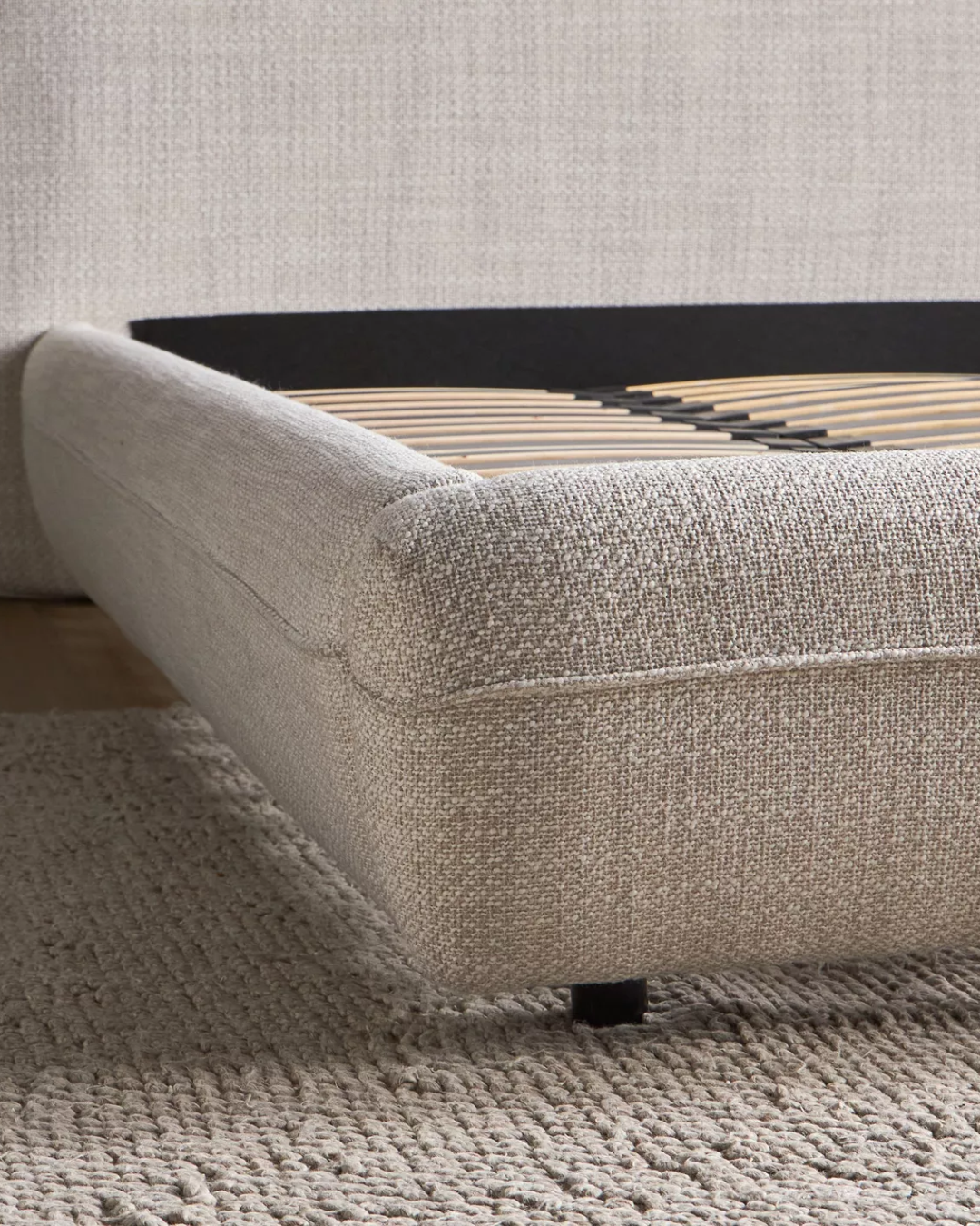 Base corner view of Oakdale bed showing seamless contour and clean stitching