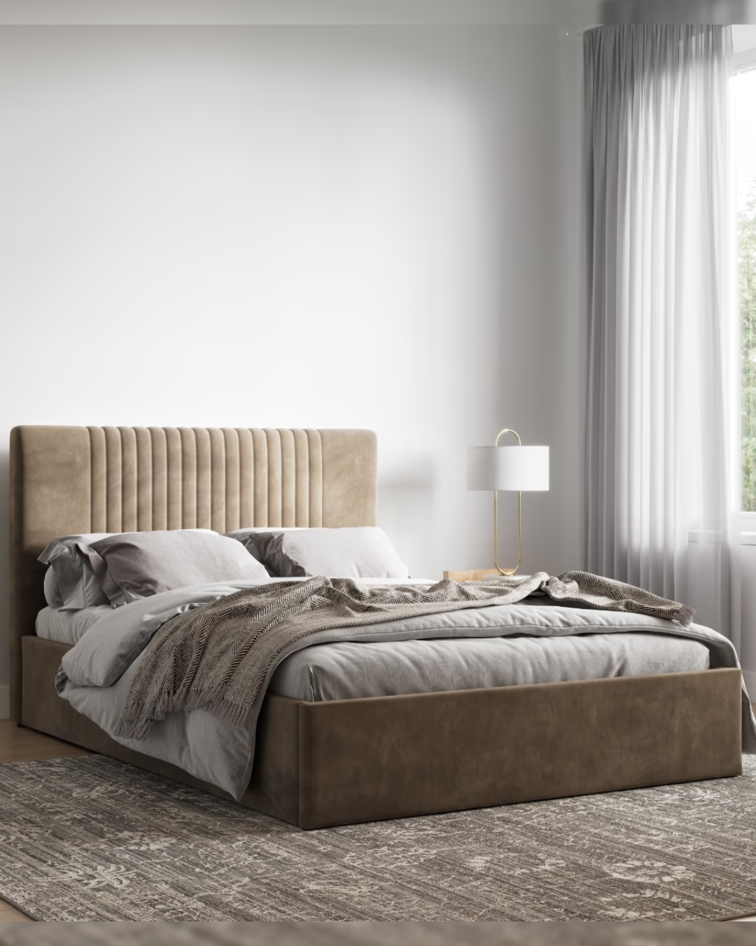 Side-angle view of Ravenleigh bed in taupe velvet with vertical padded panel headboard
