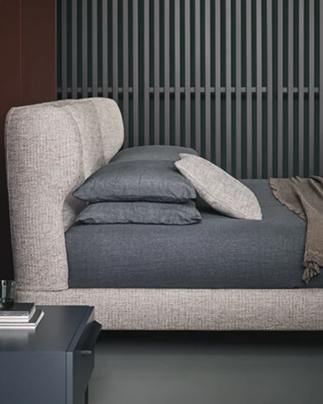 Straight side profile highlighting the low platform and metal leg base