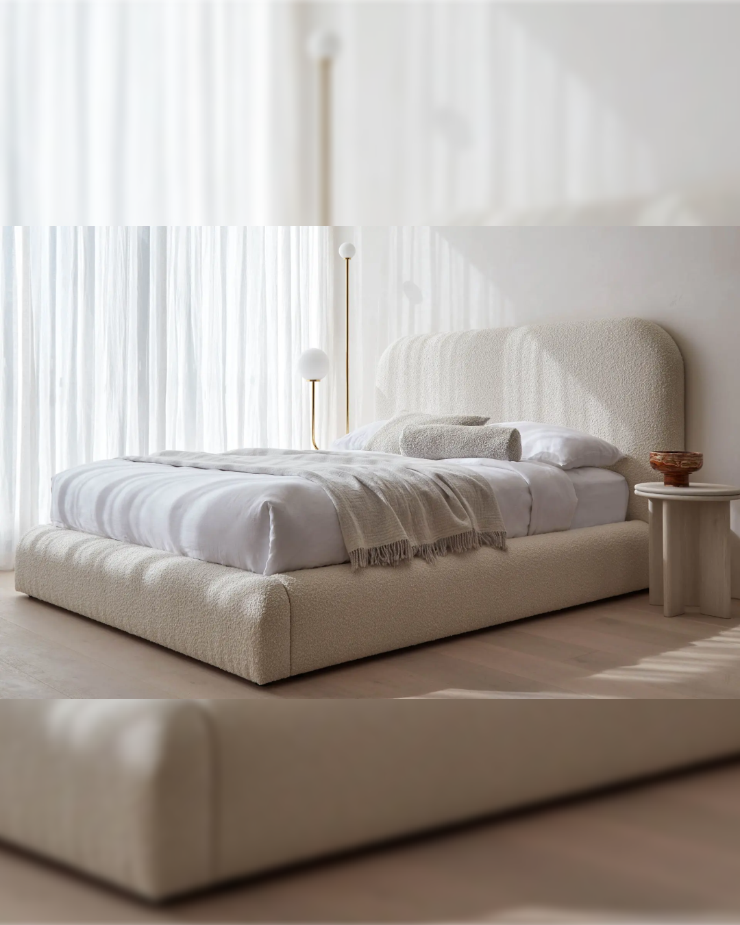 Side view of Velbrook modern low platform fabric bed in boucle finish