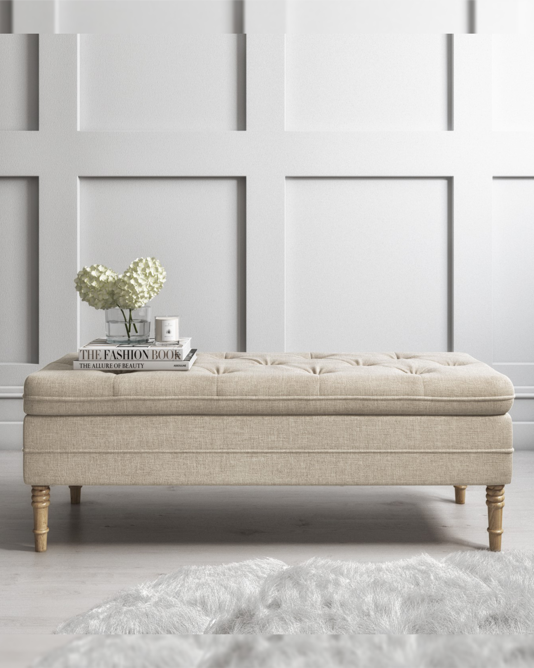 Front view of classic deep button tufted box in soft beige upholstery