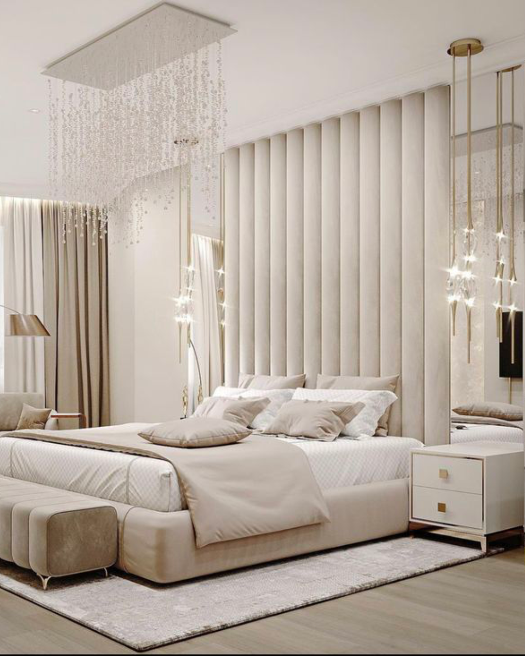 Angled room shot showing mirror headboard design and side lighting