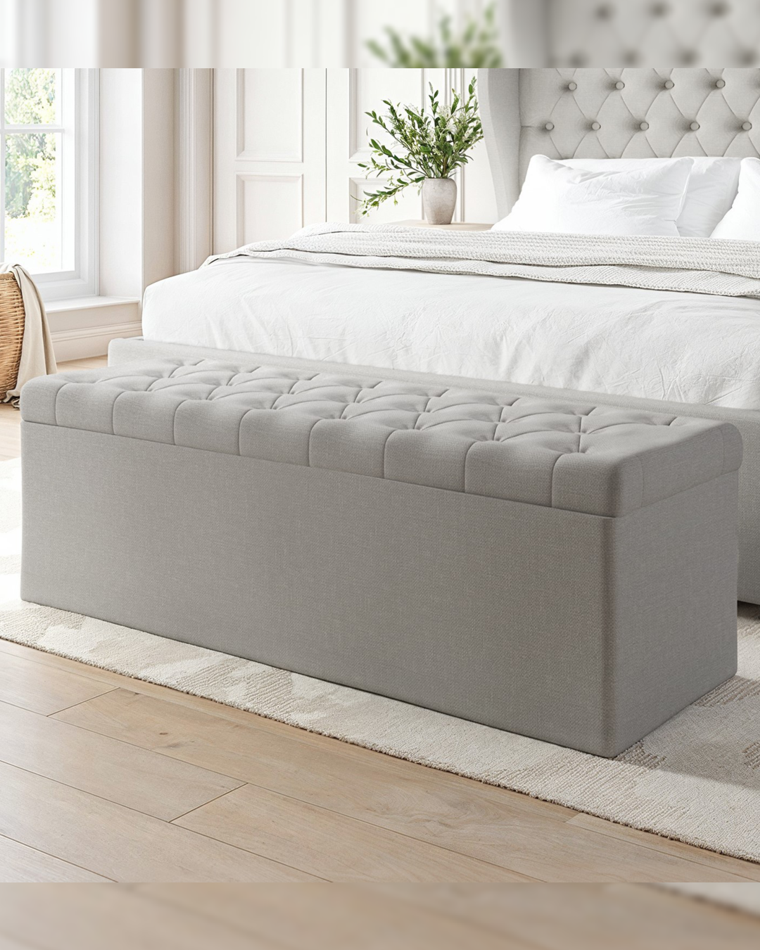 Front angled view of vintage buttoned ottoman box in neutral fabric