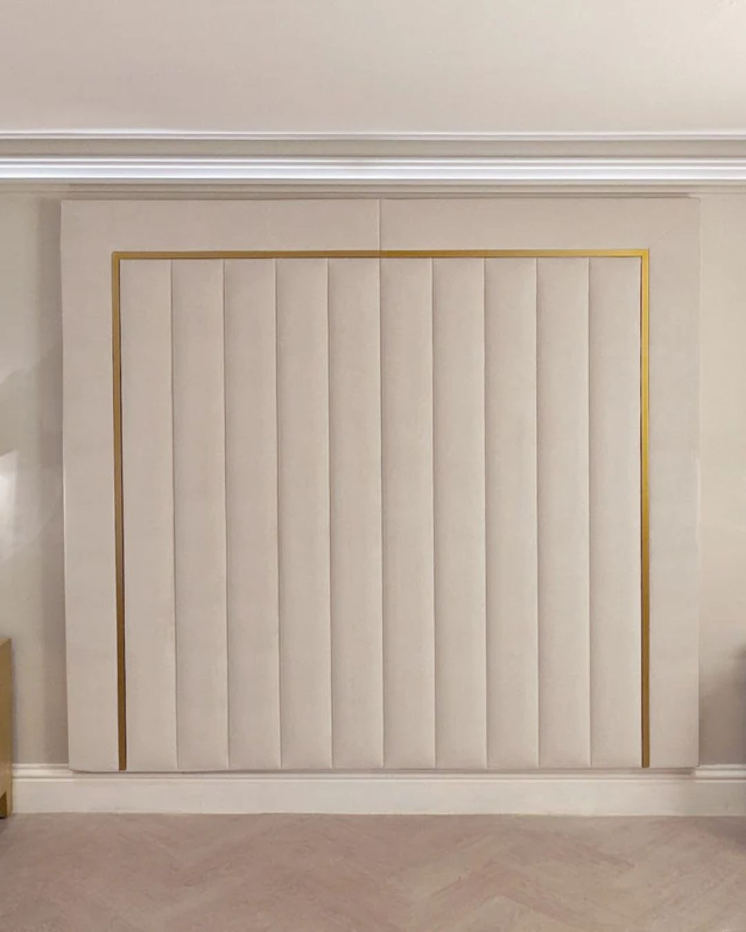 Front view of panel wall fluted headboard bed with gold trim